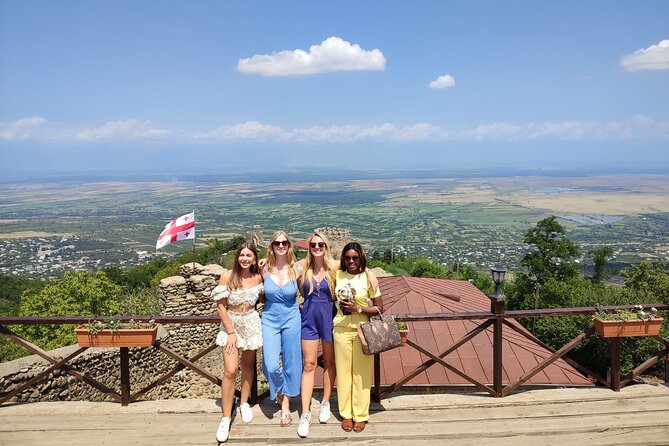 4 Group Tours Including Airport Transfers - Day 4 Kakheti Wine Day: Badiauri Baking, Bodbe Nunnery, Sighnaghi Views, and Cave Cellars