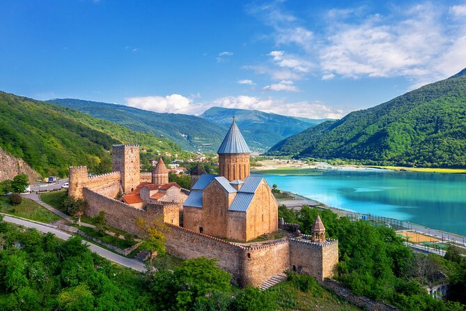 A 6-Day Private Expedition into Rich Heritage - Day 3 on the Georgian Military Highway to Kazbegi: Reservoir to Iconic Church Views