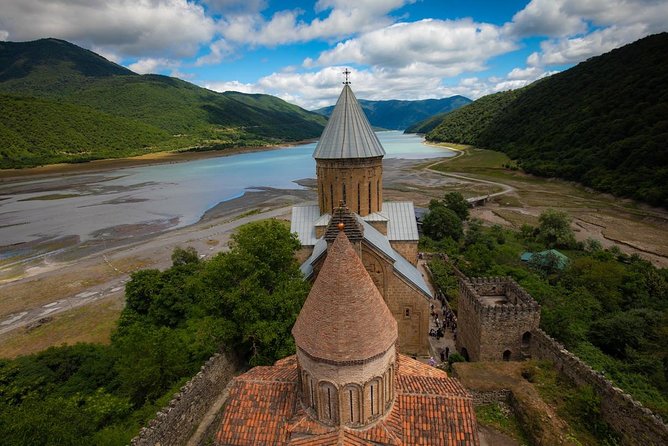 Adventure in Caucasus – Private Tour to Jinvali, Ananuri, Gudauri, Kazbegi - Stop 4: Gergeti Trinity Church, 2200 Meters Up and the 4x4 Choice
