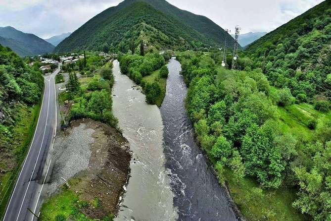Day tour to mountains Jinvali lake, Ananuri, Kazbegi, Arch friendship - Getting Around: Van Comfort, Live Listening, and the 9-Hour Timing