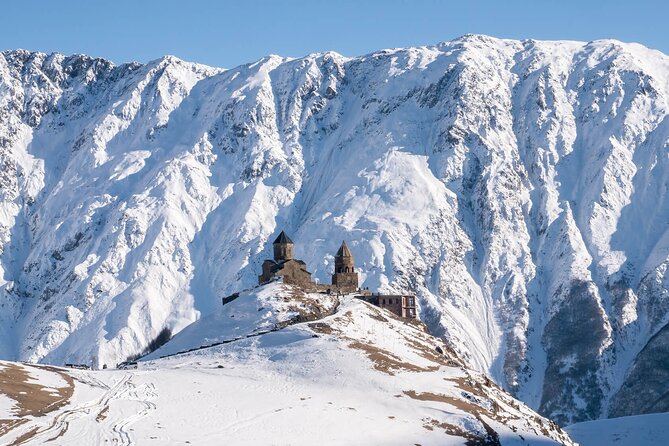 From Tbilisi Daytrip Kazbegi Gudauri & Zhinvali Guided Group Tour - Stop 5: Gudauri, Ski Country, and the Friendship Arch Views