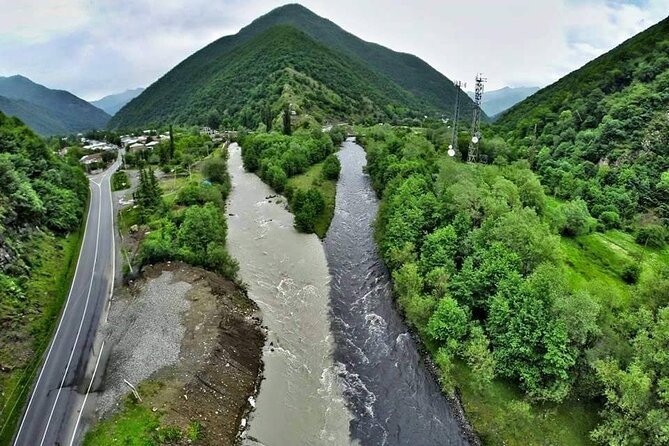 From Tbilisi: Kazbegi Day Tour, Gergeti Trinity, Ananuri &Gudauri - Stop 1, Zhinvali Water Reservoir: a lake with a buried city (and a winter surprise)