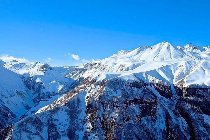 Kazbegi, Gergeti and Ananuri Full Day Tour from Tbilisi - The Friendship Monument and the quick thrill of oddball scenery