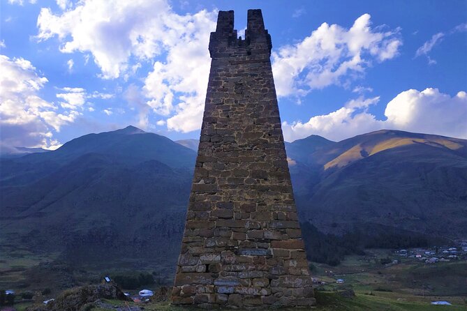 Kazbegi Tour with Gergeti Church, Waterfall Hike & Hidden Gems - Mtavarangelozi Monastery, Dariali Gorge views, and a border-near feel