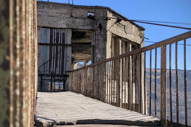 Soviet past - Private day tour to Chiatura, Katskhi pillar and Chronicles - Mgvimevi Monastery in a cave: where architecture meets rock