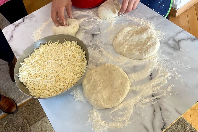 Tbilisi Food Tour in a Local Family - Stop 1: The meeting point, friendly intro, and a first sip