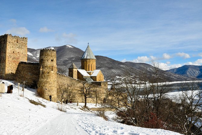 Tour to Kazbegi Ananuri Zhinvali Gudauri Full Day - Getting picked up in Tbilisi and staying comfortable on the road