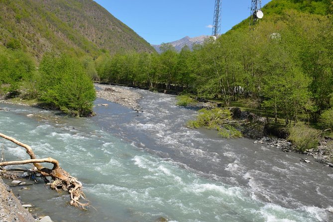 Tour to Kazbegi: Georgian Military Road – Ananuri – Gudaury – Kazbegi - Ananuri Fortress complex: churches, carvings, and a prison well