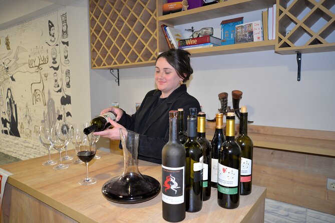Wine Tasting in Tbilisi - The drinks menu: four wines, chacha, water, and a dry fruit board
